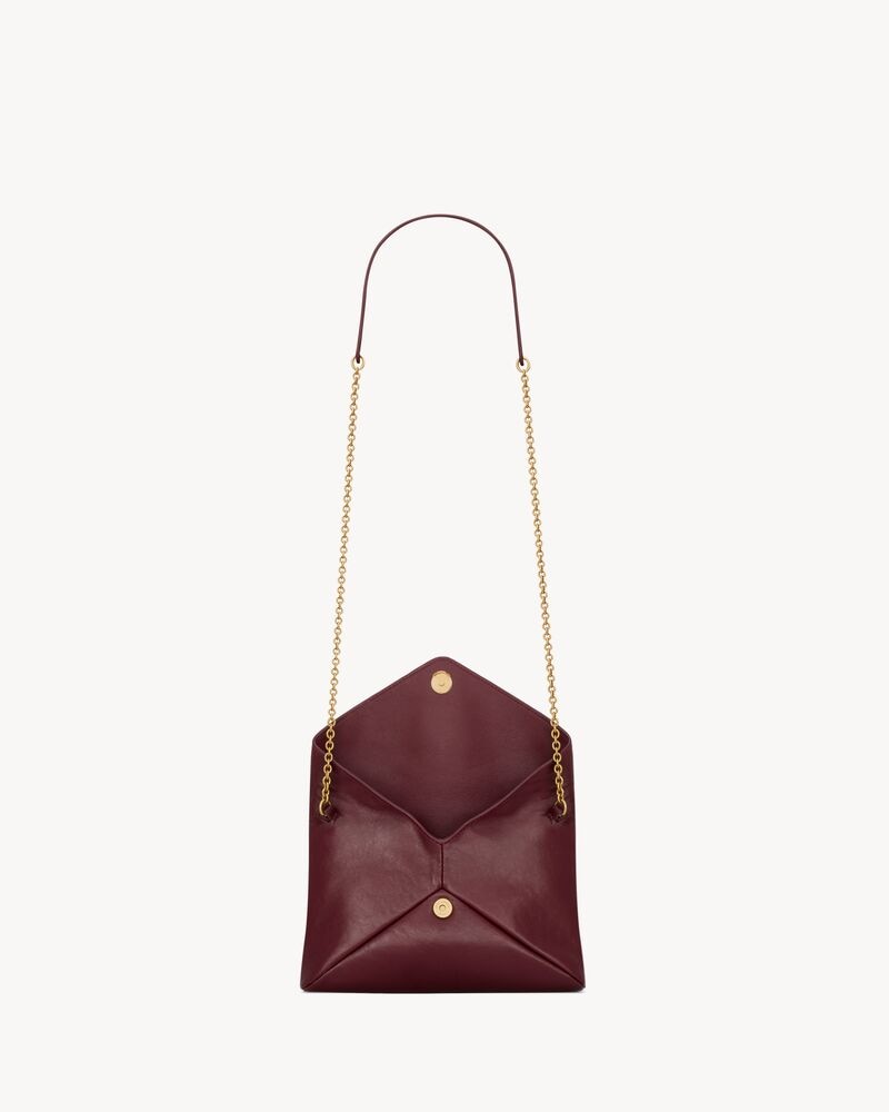 CASSANDRE chain pouch in shiny leather