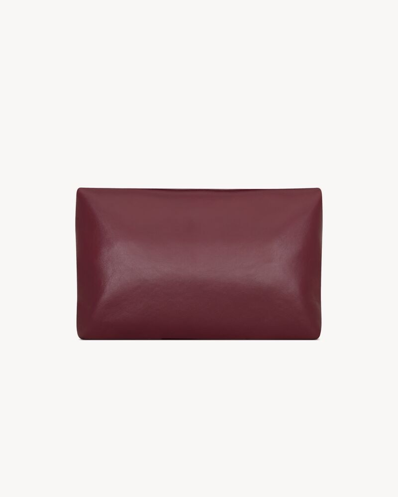 CASSANDRE large envelope pouch in shiny leather
