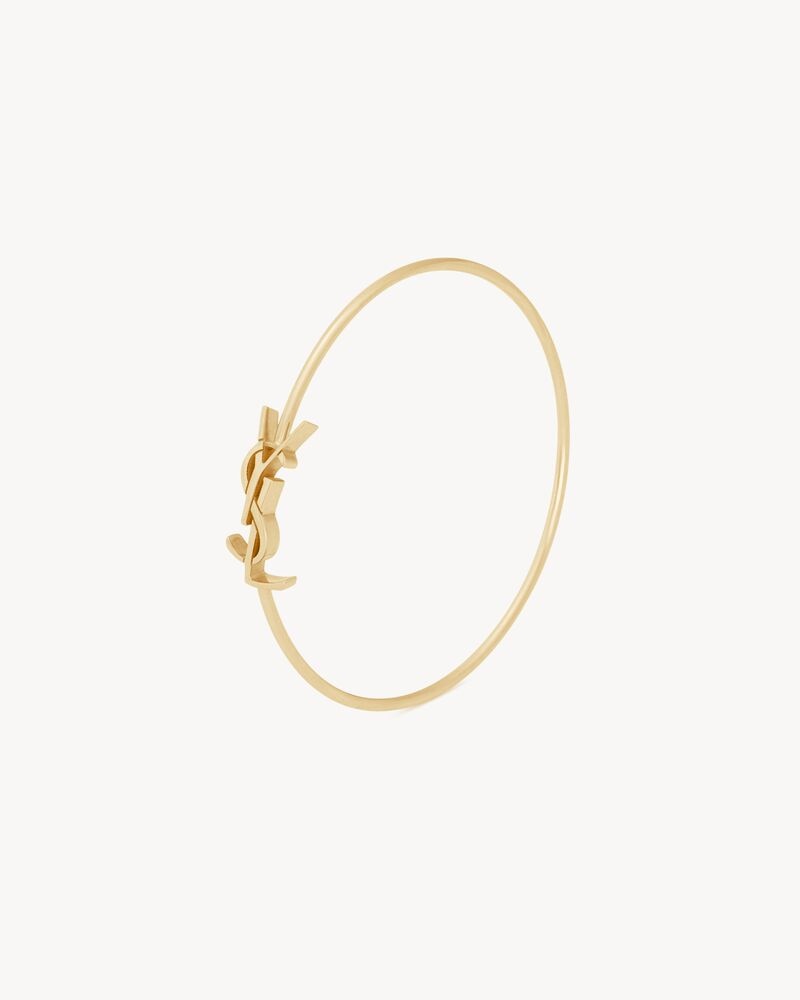 CASSANDRE bangle in 18K yellow gold