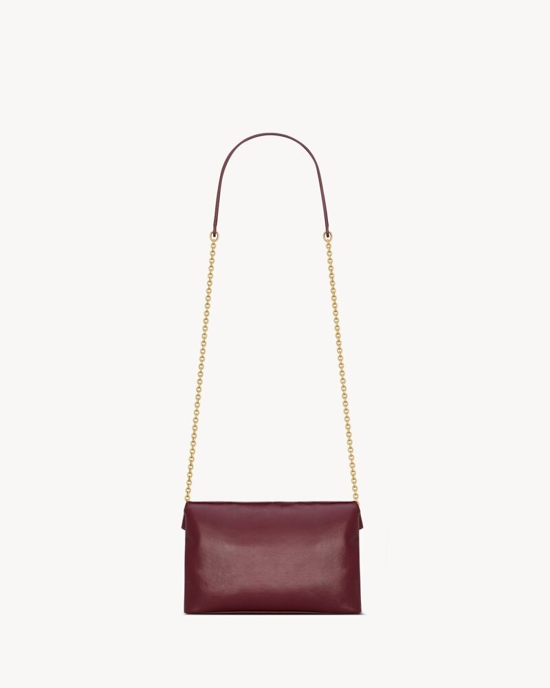 CASSANDRE chain pouch in shiny leather