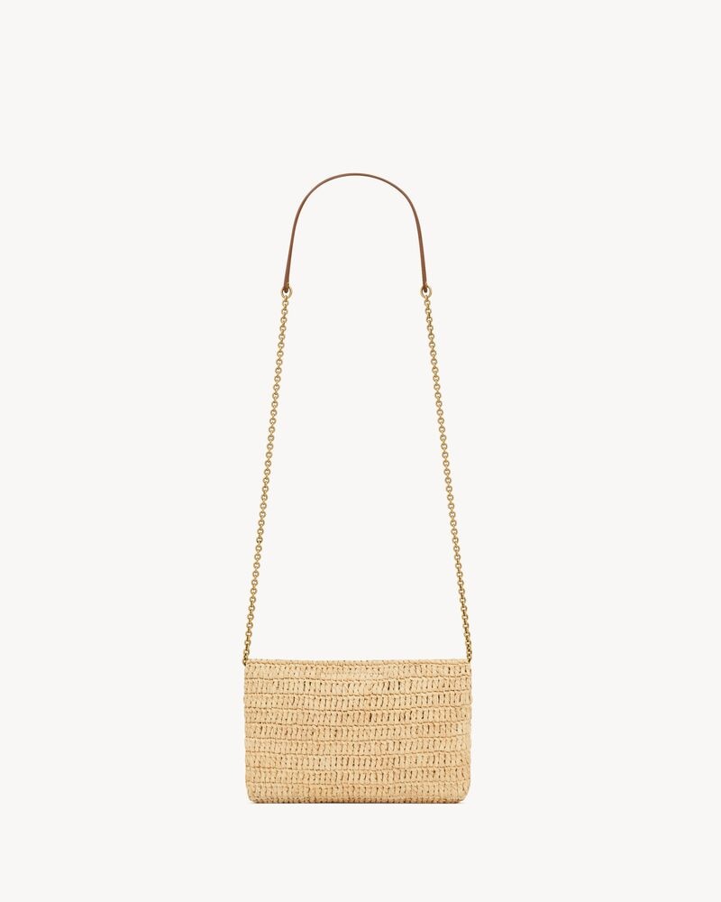 CASSANDRE chain pouch in raffia